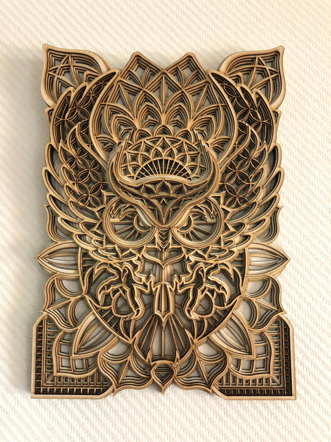 Spiritual wooden owl mandala