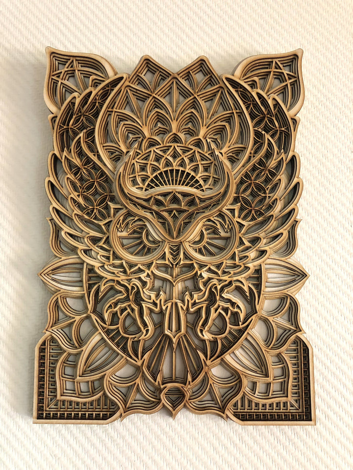 Spiritual wooden owl mandala