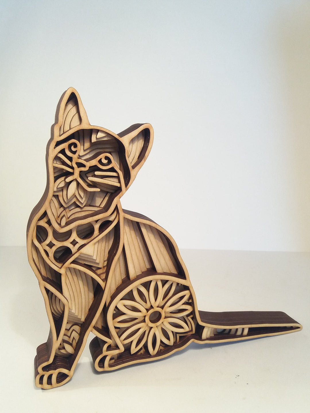 Wooden cat mandala