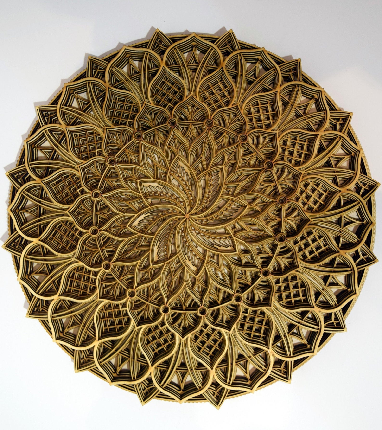 Round wooden mandala with engraved back, handcrafted layered wall art
