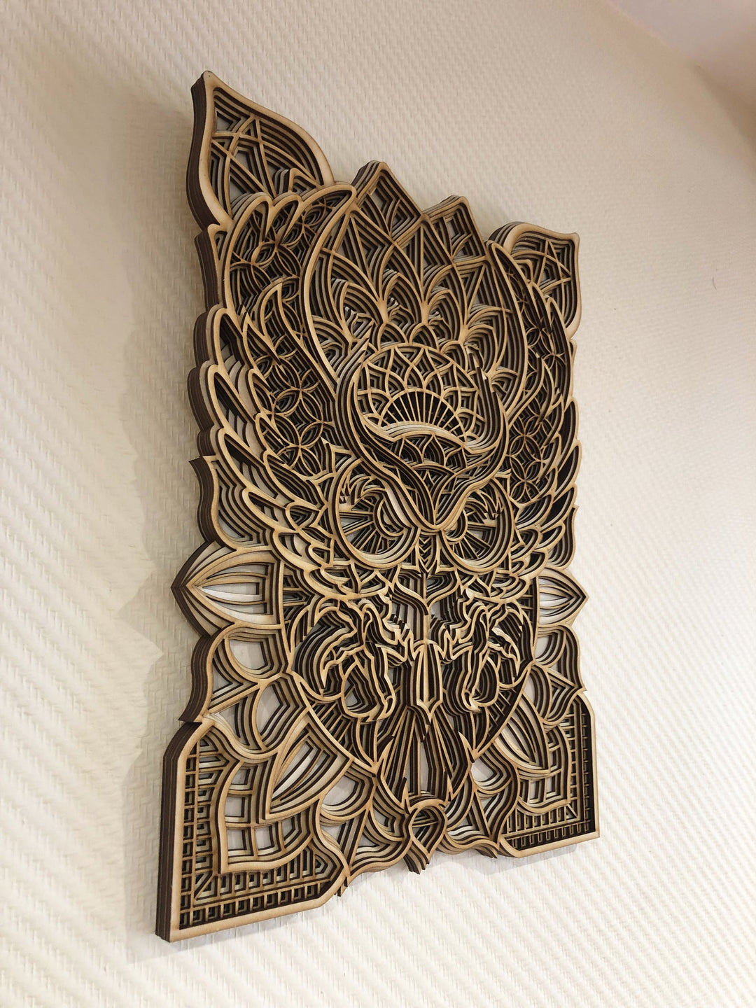 Spiritual wooden owl mandala