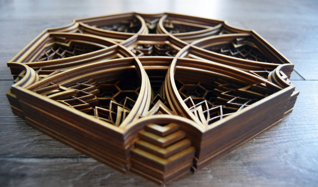 Laser-cut geometric mandala in wood, hexagonal layered structure